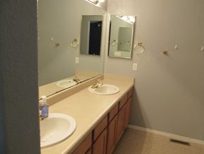 Soldotna house for rent - A bathroom with a sink and mirror.