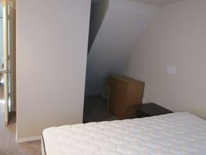 Soldotna apartment for rent - A bedroom with a mattress on the floor.