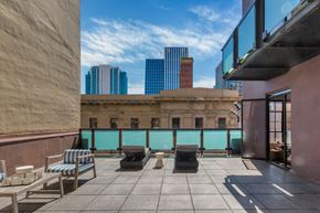 San Francisco apartment for rent - a balcony with a view of a city and a pool
