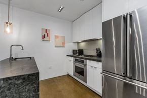 San Francisco apartment for rent - a kitchen with stainless steel appliances and a stainless steel refrigerator
