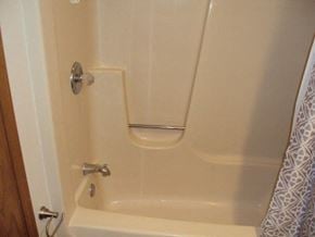 Rantoul apartment for rent - a white shower with a handle in a bathroom