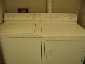 Rantoul apartment for rent - two white washes sitting next to each other
