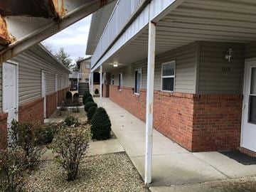 Rantoul apartment for rent - a sidewalk in front of an apartment building