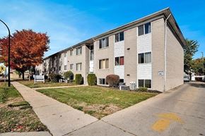 Ferndale apartment for rent - Apartment building with a yellow arrow on the pavement.