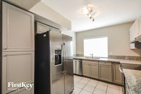 Tucson house for rent - the kitchen has stainless steel appliances and granite counters
