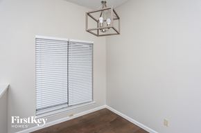 Mesquite house for rent - a living room with a window and a chandelier