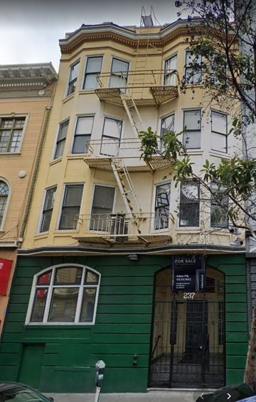 San Francisco apartment for rent - a building with a fire escape on the side of it