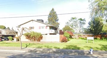 Santa Rosa apartment for rent - a white house on the side of a street