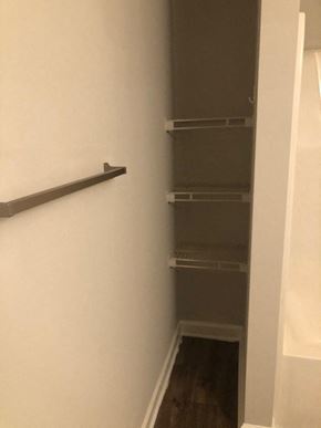 Youngsville apartment for rent - A white wall with a shelf and a doorway.