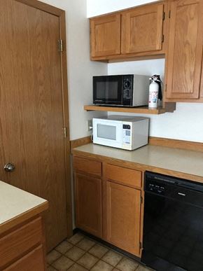 Nikiski apartment for rent - a small kitchen with a microwave on the counter