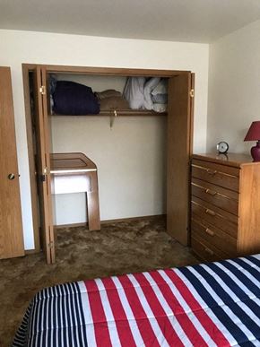 Nikiski apartment for rent - a bedroom with a bunk bed and a desk
