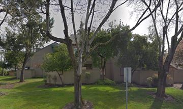 Rohnert Park apartment for rent - a house with a yard and trees in front of it