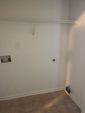Youngsville apartment for rent - A white wall with a small hole in it.