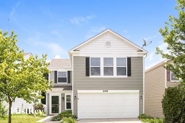 Noblesville house for rent - a gray house with a white garage door