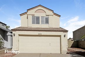 Glendale house for rent - A house with a garage door that says 3954 on it.