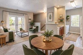 Wayne townhouse for rent - A dining room with a round table and chairs.
