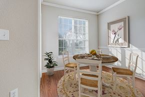 Lafayette apartment for rent - a dining room with a table and chairs and a window