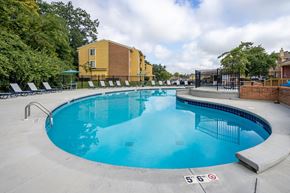 Fairfield apartment for rent - A swimming pool with a height restriction sign of 5'6" on the ground.