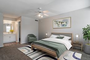 Norcross apartment for rent - a bedroom with a bed and a ceiling fan