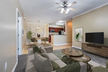 Slidell apartment for rent - a living room with a couch and a table