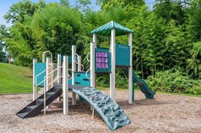 Cockeysville apartment for rent - a playground with a slide and a climbing structure