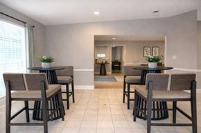 Augusta apartment for rent - A dining room with a table and chairs.