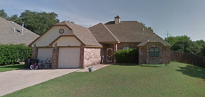 Harker Heights house for rent - a brick house with a garage and a lawn