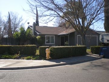 Patterson house for rent - a house with a yellow fire hydrant in front of it