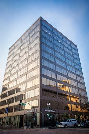 San Ramon apartment for rent - a tall building on the side of a street