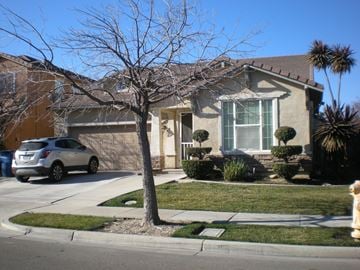 Patterson house for rent - a house with a car parked in front of it