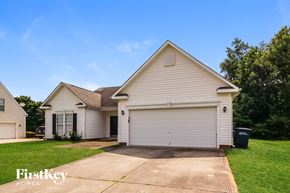 Troutman house for rent - A two-story house with a garage is for sale.