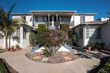 Los Angeles apartment for rent - the front of a house with a garden in front of it