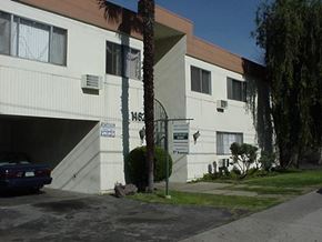 Van Nuys apartment for rent - a building with a car parked in front of it