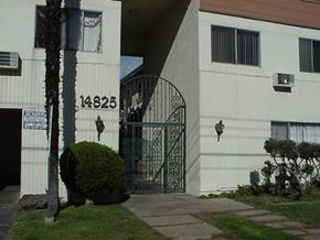 Van Nuys apartment for rent - a wrought iron gate in front of a building