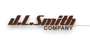 Yakima apartment for rent - the all smith company logo in the dark
