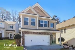 Sugar Hill house for rent - a house with a white garage door in front of it