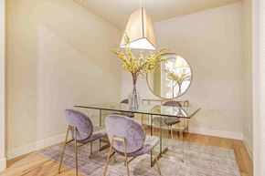 Pasadena apartment for rent - a dining room with a glass table and chairs