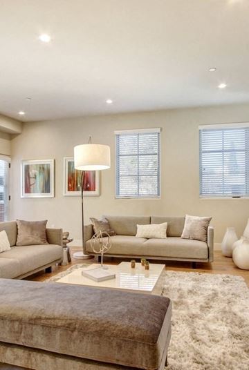 Pasadena apartment for rent - a living room with couches and a table and a lamp