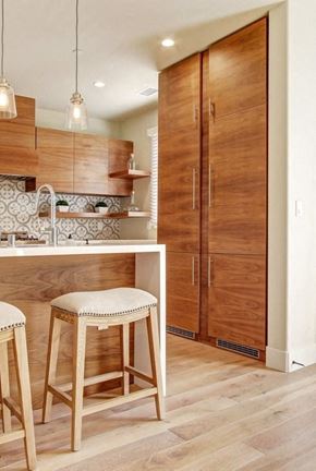Pasadena apartment for rent - a kitchen with a bar stool and a refrigerator