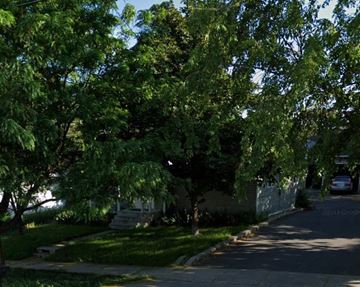 Logan apartment for rent - a tree in the front yard of a house