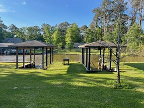 Trinity house for rent - a park with gazebos near a body of water