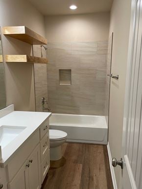 Trinity house for rent - A white bathroom with a toilet, sink, and bathtub.