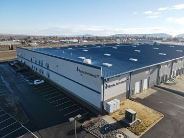 Yakima apartment for rent - an aerial view of a building with a blue roof
