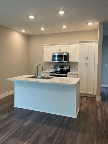 Jeffersonville apartment for rent - a kitchen with a counter top and a microwave