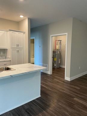 Jeffersonville apartment for rent - an empty kitchen with a sink and a counter top