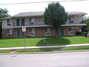 Denton apartment for rent - an image of an apartment building with a no parking sign