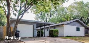 Fort Worth house for rent - a white house with a garage and a tree