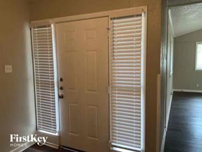 Fort Worth house for rent - a white door with white shutters and a white closet door
