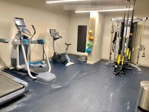 National City apartment for rent - a gym with some exercise equipment on the floor
