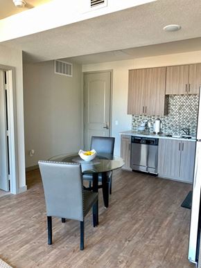 National City apartment for rent - a kitchen and dining room with a table and chairs